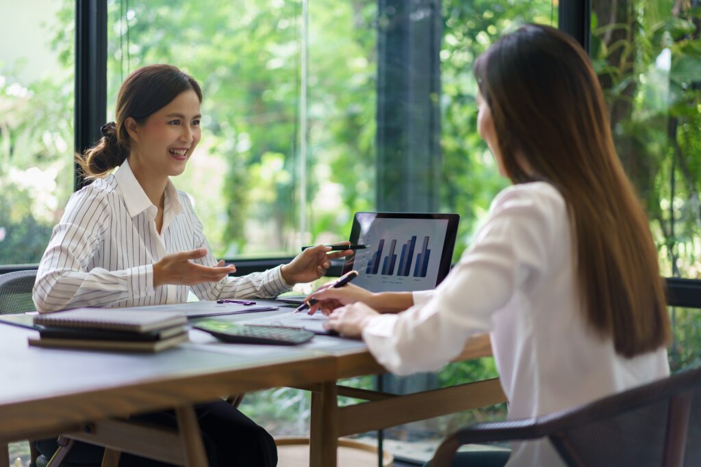 Two businesswomen having a peer mentorship session