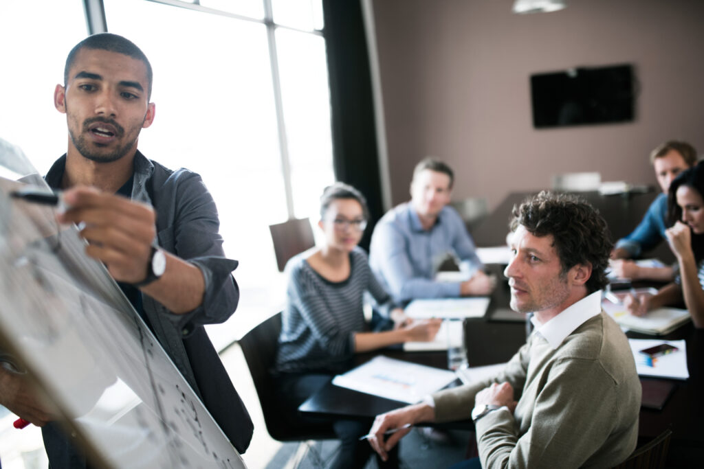 Business professionals attending a sales training and development.