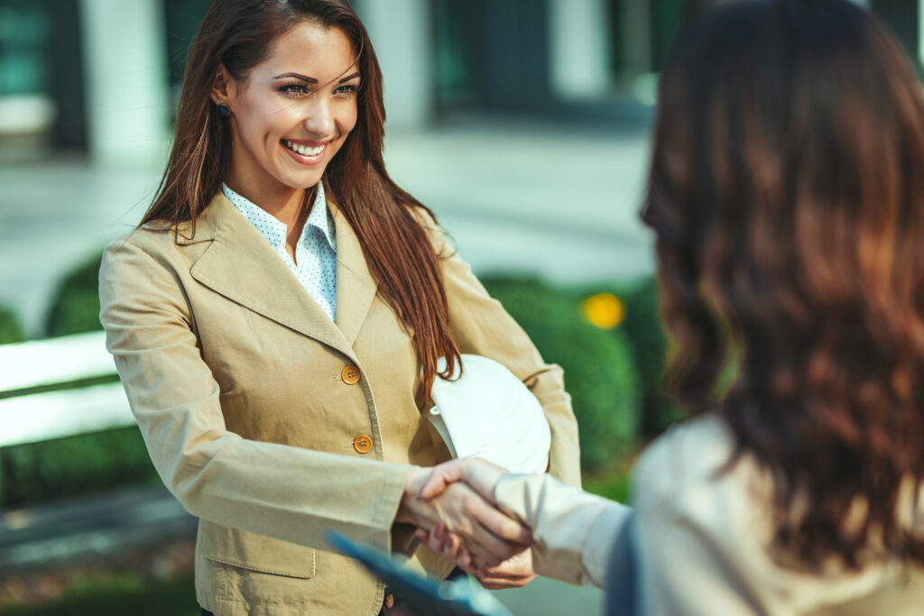 Sales professional building rapport with a customer.​