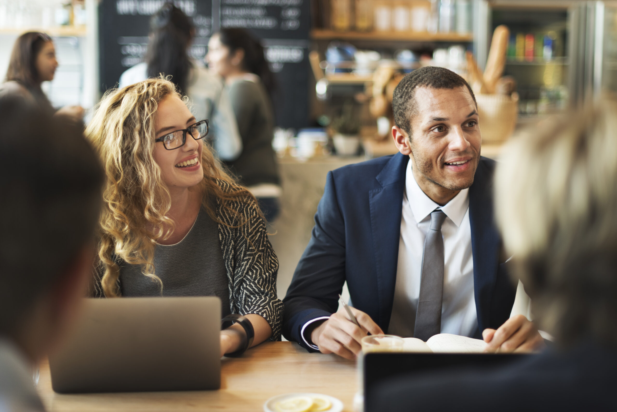 Sales team talking to the clients during a relationship marketing.